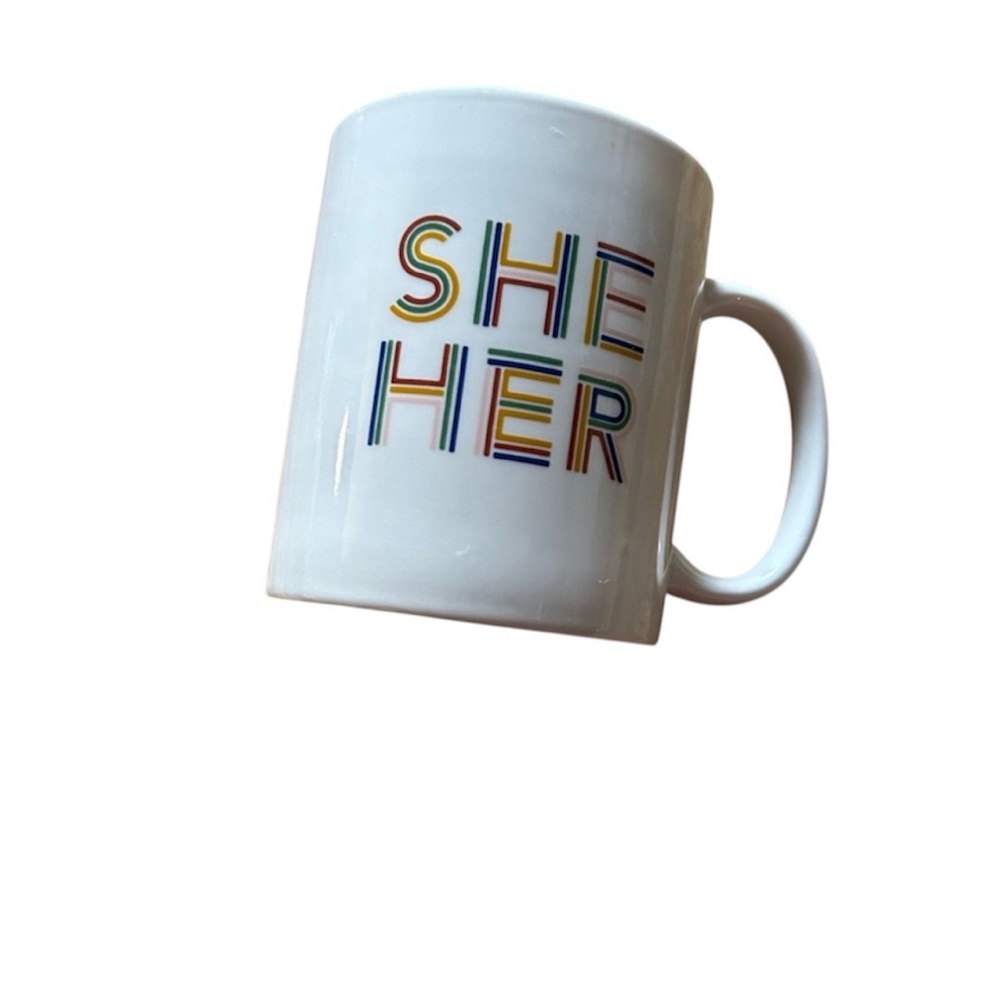 Room Essentials “She Her” coffee mug- white mug with rainbow text